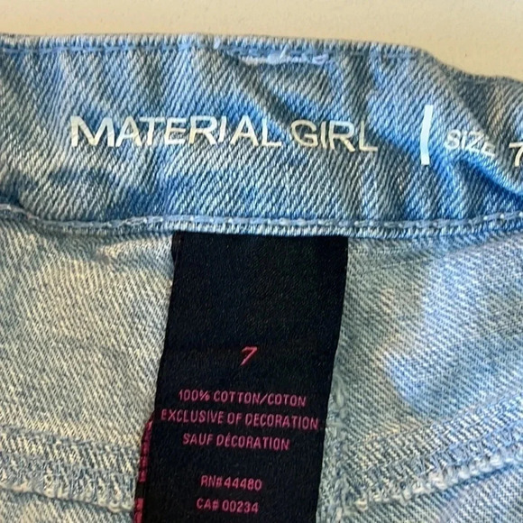 Material Girl light wash jean shorts with black velvet embellishments. Size 7 - Picture 4 of 9